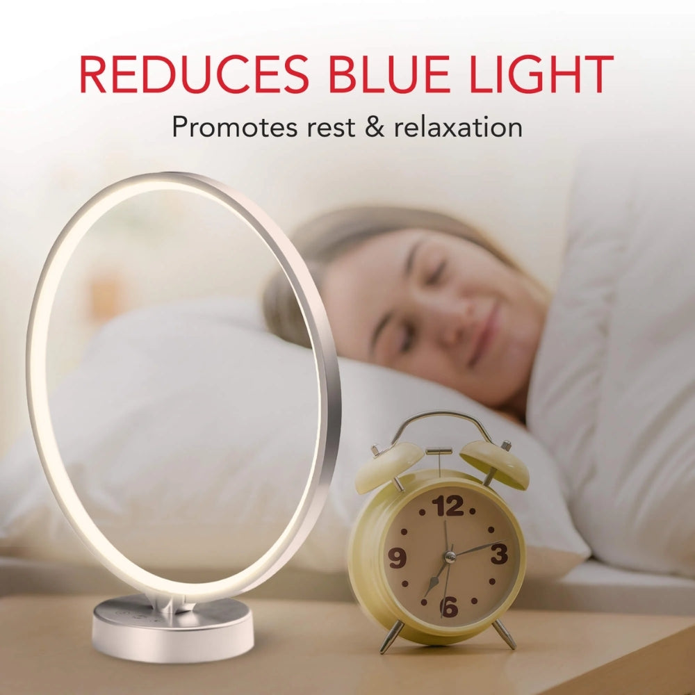 Lamp reducing blue light with a woman sleeping in the background
