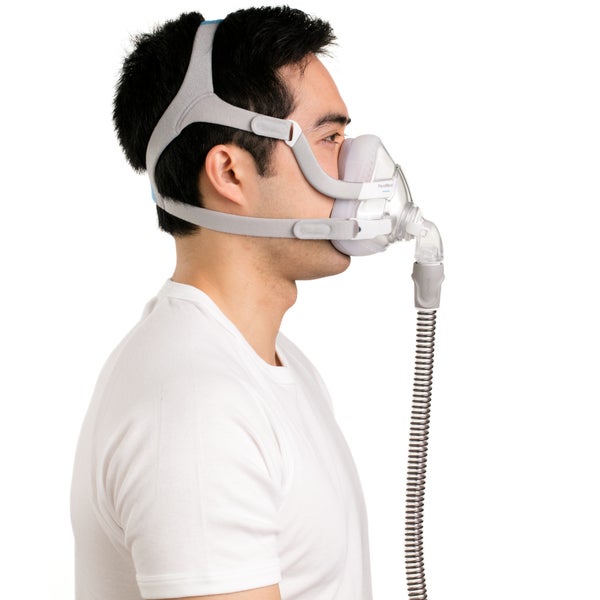 Side view of man wearing the ResMed AirTouch F20 full face CPAP mask