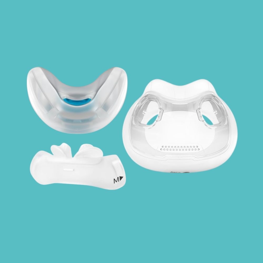 Three different types of CPAP mask cushions (nasal, nasal pillows and full face) on a teal background
