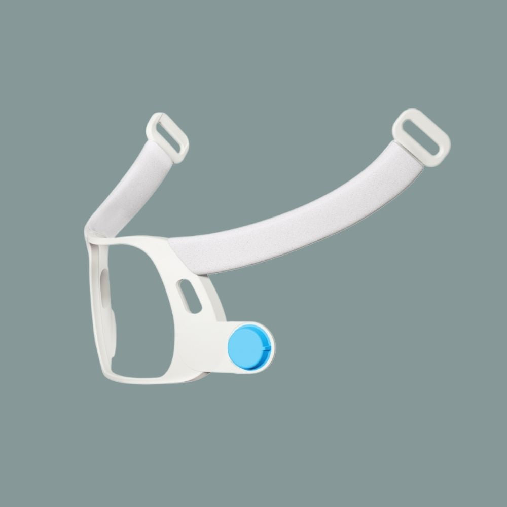 White CPAP mask frame on a grey background