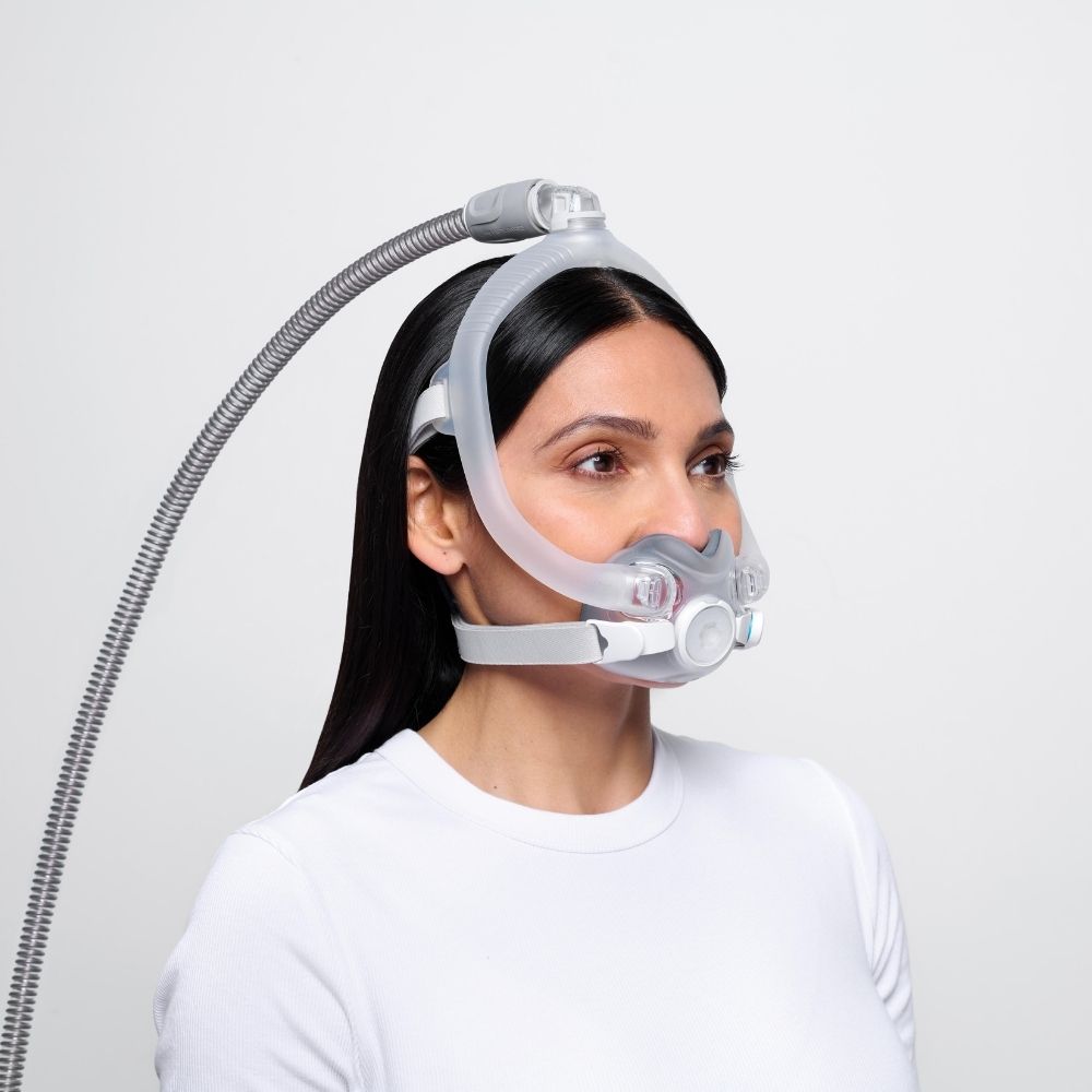 Side profile of a person wearing the Resmed AirTouch F30i full face mask