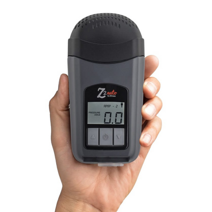 Breas Z2 Travel CPAP device in hand