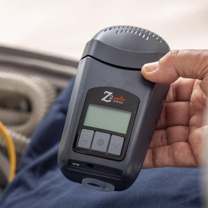 Breas Z2 Travel CPAP device in hand