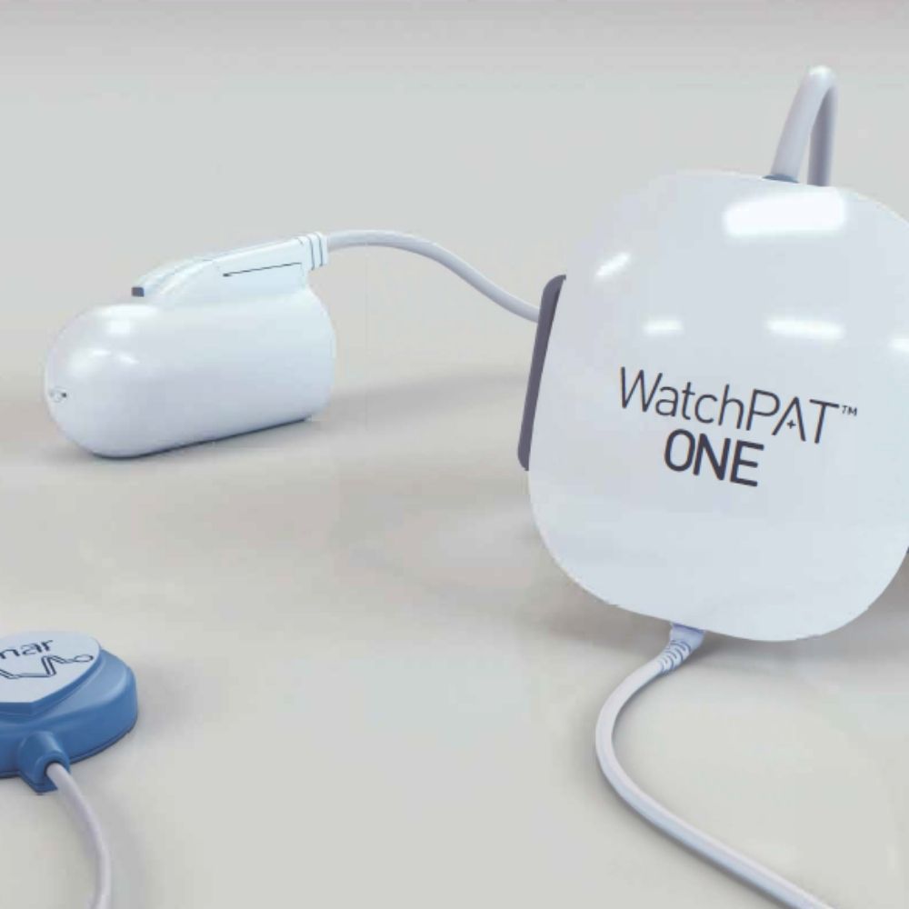 WatchPAT ONE device on a light surface