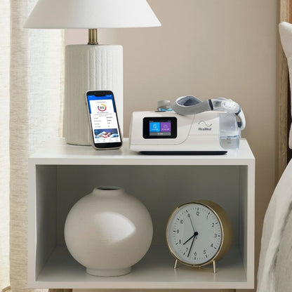 ResMed AirCurve 11 BiPAP device with AirFit N30i CPAP mask and myAir app on phone