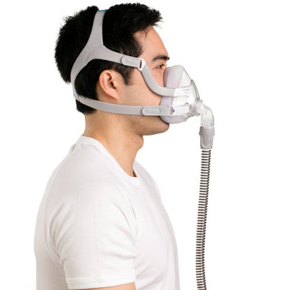 Side view of man wearing the ResMed AirTouch F20 full face CPAP mask