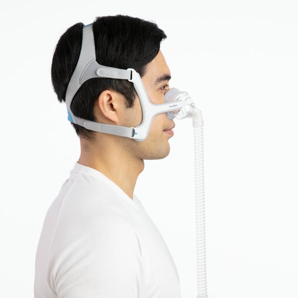 Side profile of a person wearing the ResMed AirTouch N20 Nasal CPAP Mask