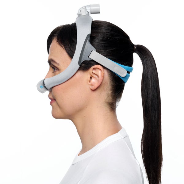 Side profile of  person wearing the ResMed AirTouch N30i Nasal CPAP Mask